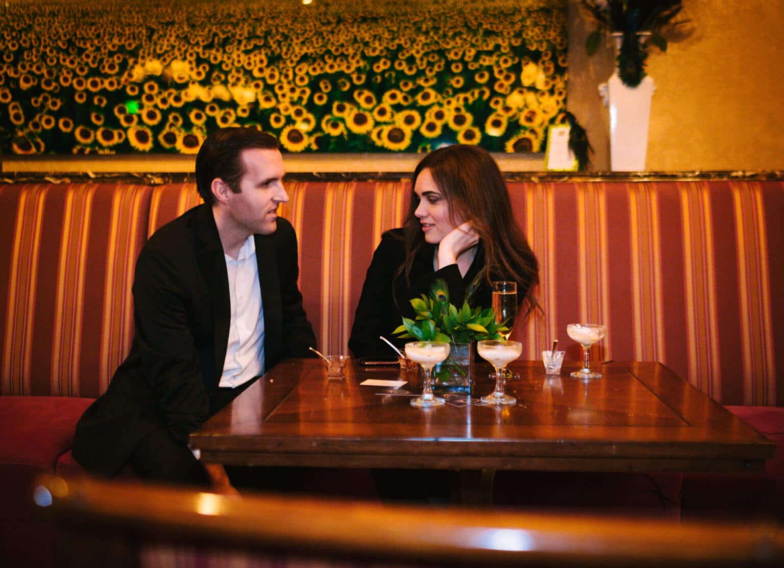 Professional photography capturing a romantic moment at an upscale event.